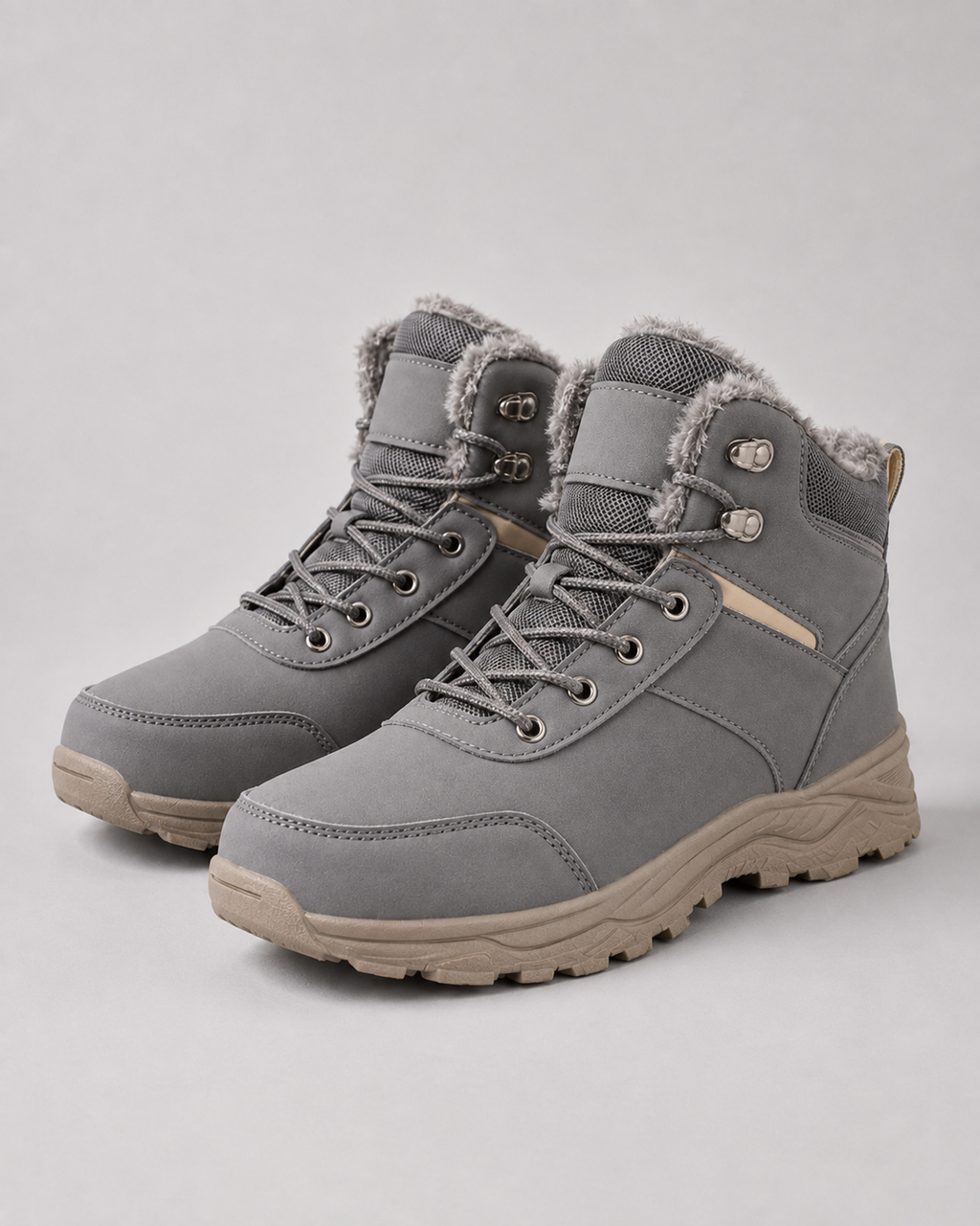 Gray lug sole ankle boots with plush-lined collars and lace-up closures