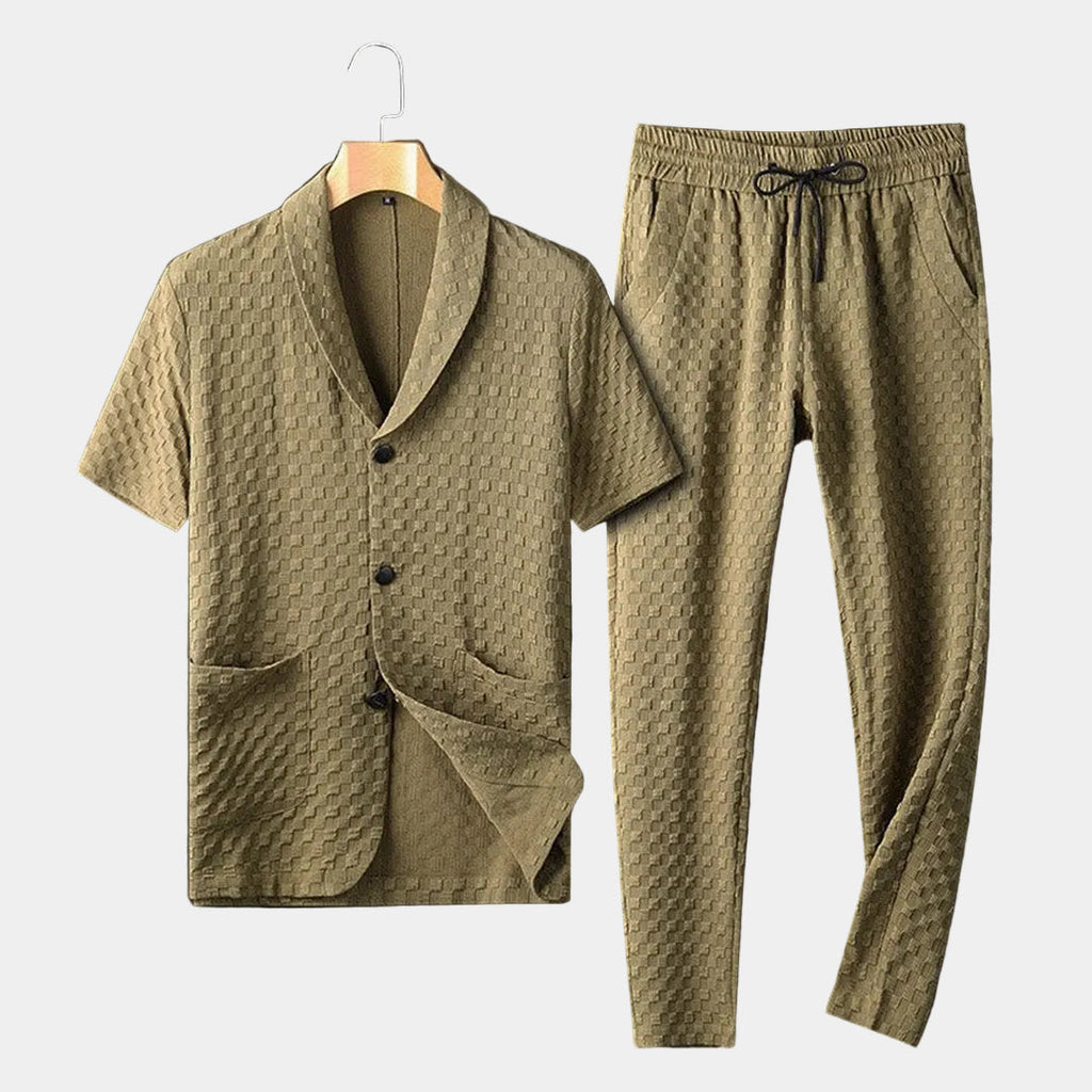 Men's khaki textured short-sleeve lounge shirt with matching drawstring pants displayed as a coordinated casual outfit.