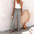 Women's gray high-waisted wide-leg linen pants with front button details, a relaxed fit, and side pockets.