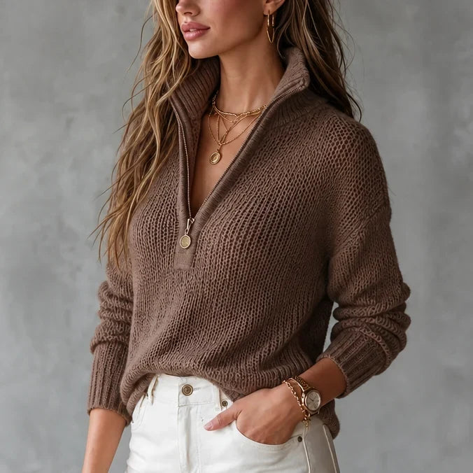 Open-knit half-zip pullover worn by a female model in brown, front view