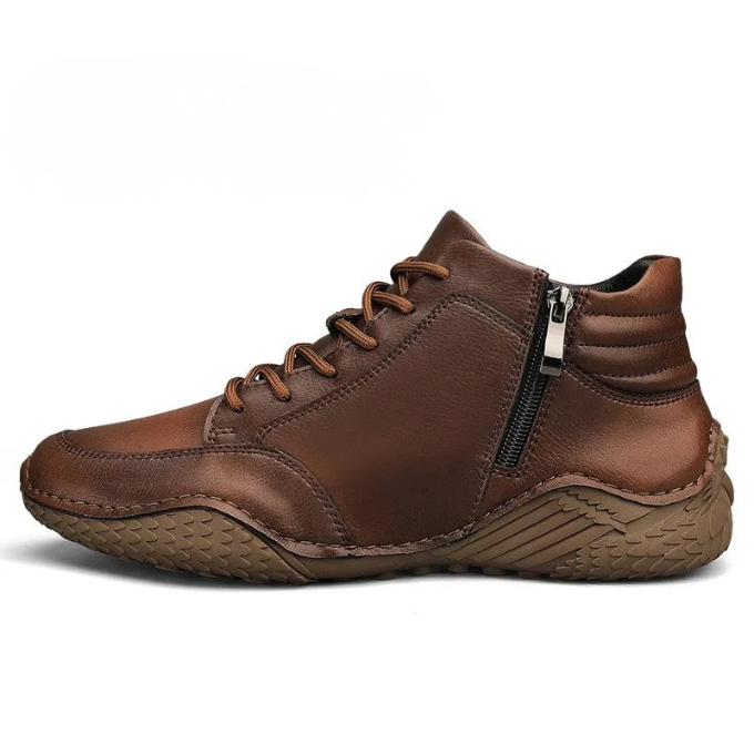 A brown leather zip-up ankle boot shown in side profile on a plain white background.