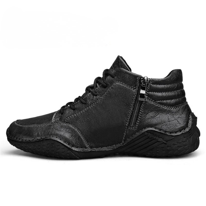A black leather zip-up ankle boot shown in side profile on a plain white background.