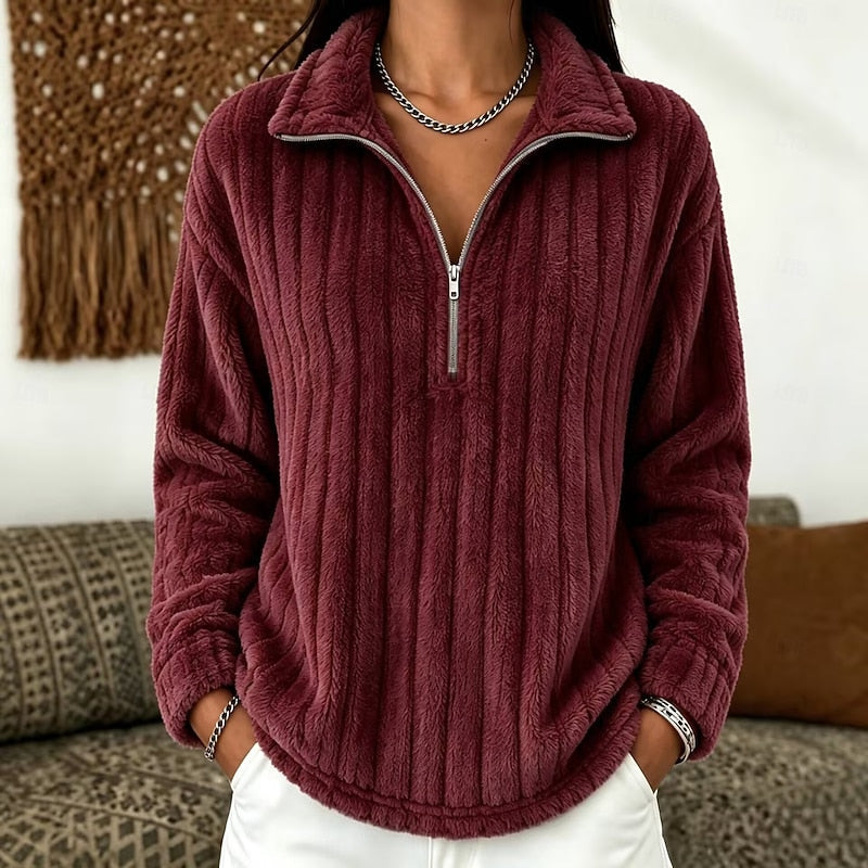 Plush burgundy ribbed half-zip pullover with a fold-over collar and relaxed drop-shoulder fit.