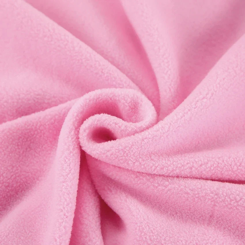 Close-up of pink fleece fabric texture and soft finish