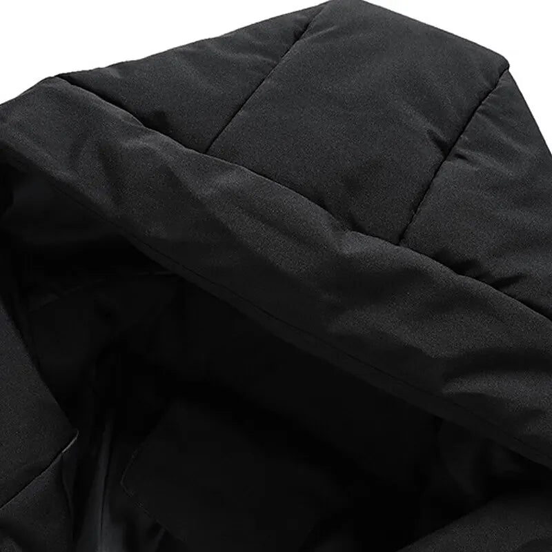 Black quilted puffer jacket hood with padded channels and a matte, lightweight shell fabric finish.