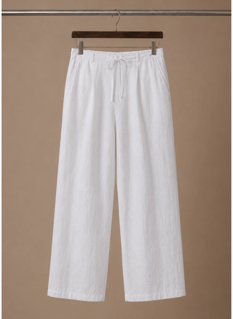 Men's white linen drawstring pants with a relaxed straight-leg fit and elastic waistband displayed on a hanger.