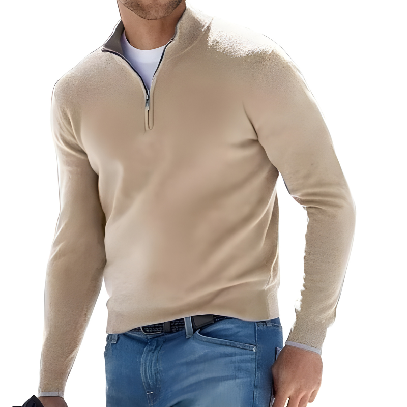 Khaki half-zip knit sweater featuring a stand collar and long sleeves, paired with blue jeans for a smart casual look.
