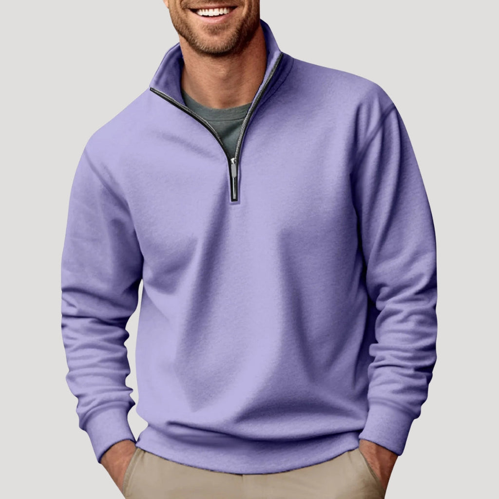 Lavender quarter-zip sweater in soft brushed fabric with a stand collar, relaxed fit, and ribbed cuffs worn over a tee.