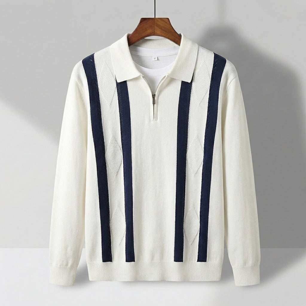 Off-white long-sleeve knit polo with navy vertical stripes, a quarter-zip collar, and a textured diamond pattern.