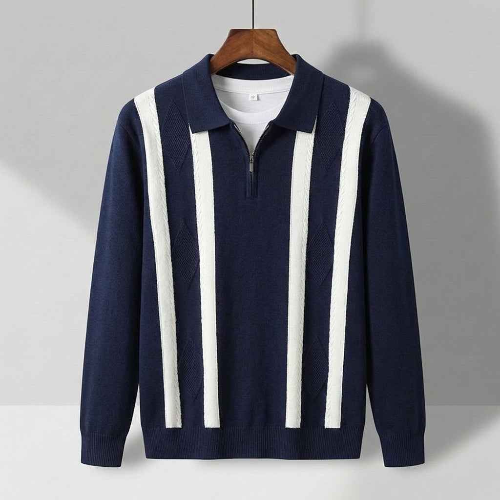 Navy blue long-sleeve knit polo with white vertical stripes, a quarter-zip collar, and textured diamond-patterned panels.