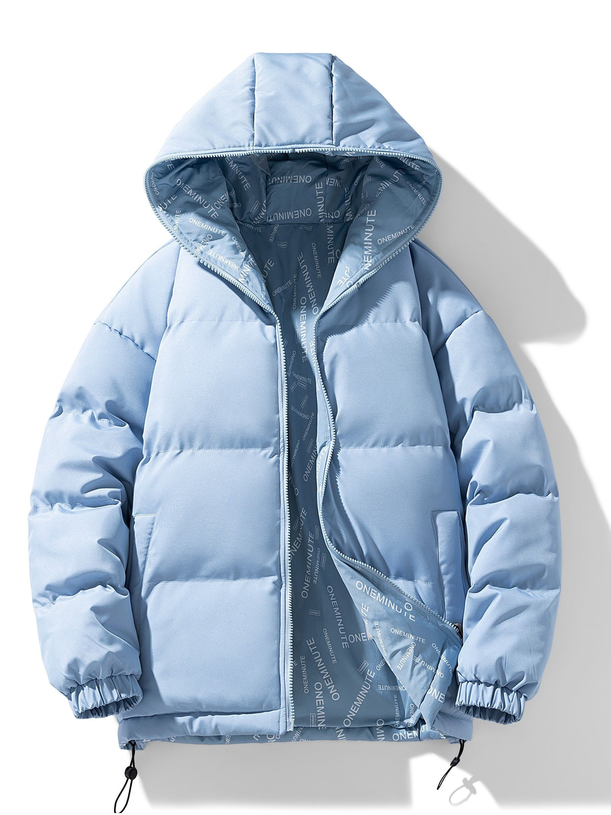 A light blue reversible hooded quilted jacket with a padded design, front view