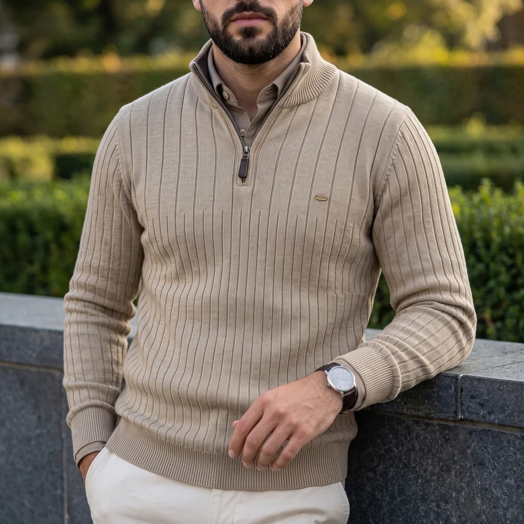 Beige ribbed knit quarter-zip sweater in a cotton blend with a mock neck, layered over a collared shirt in a regular fit.