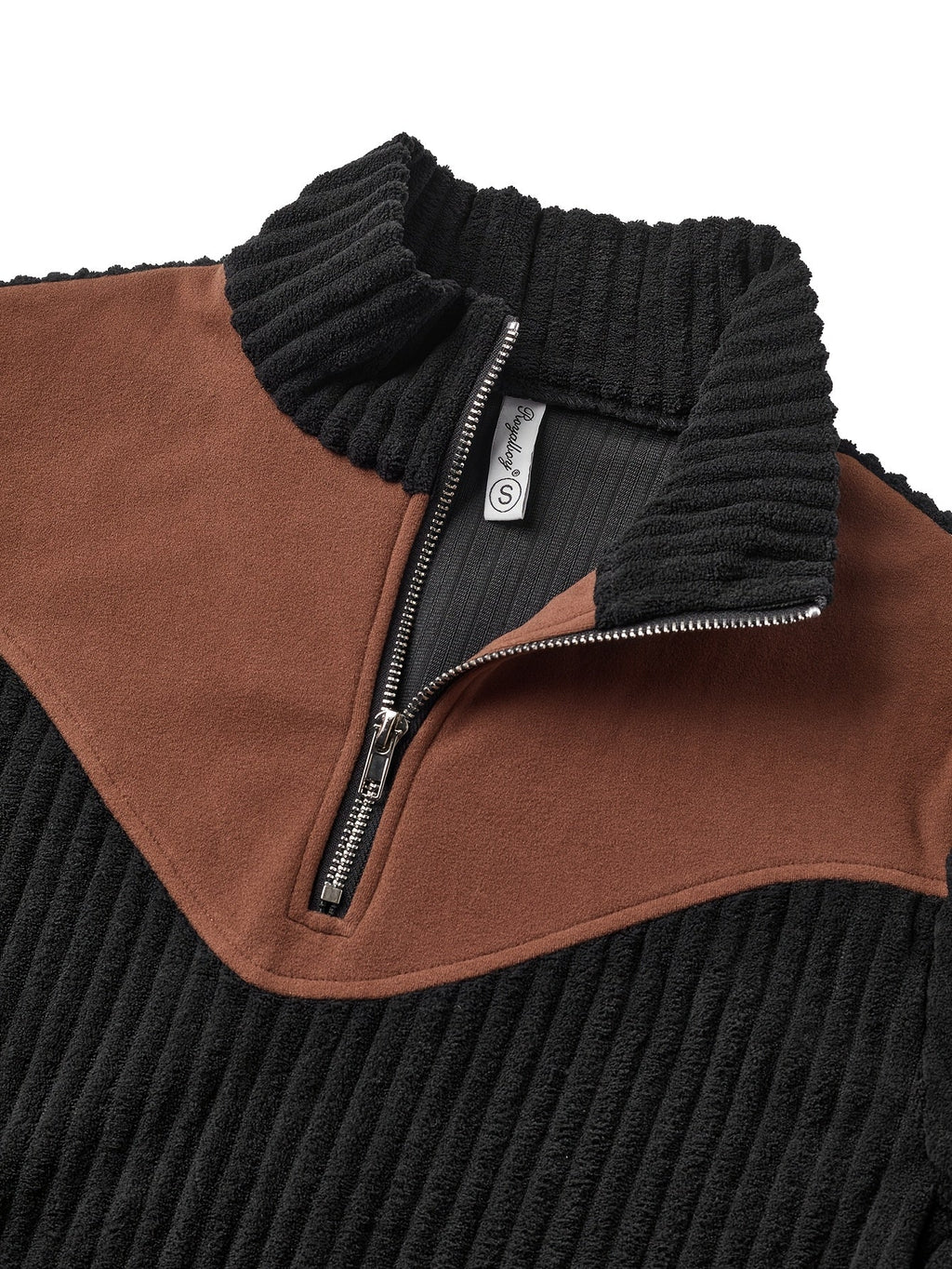 Black ribbed knit quarter-zip sweater featuring a brown suede-look yoke and stand collar.