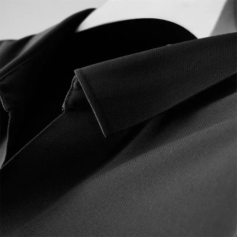Close-up of the polo shirt collar featuring a structured design and smooth fabric finish.