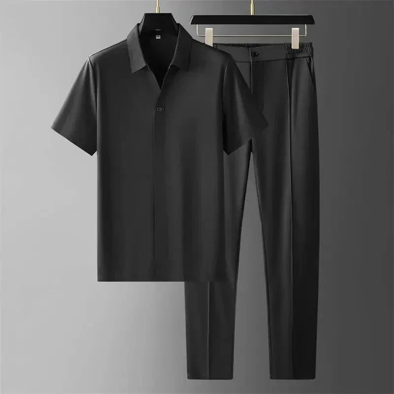Men's charcoal short-sleeve polo shirt paired with black straight-leg pants in a matching outfit set.