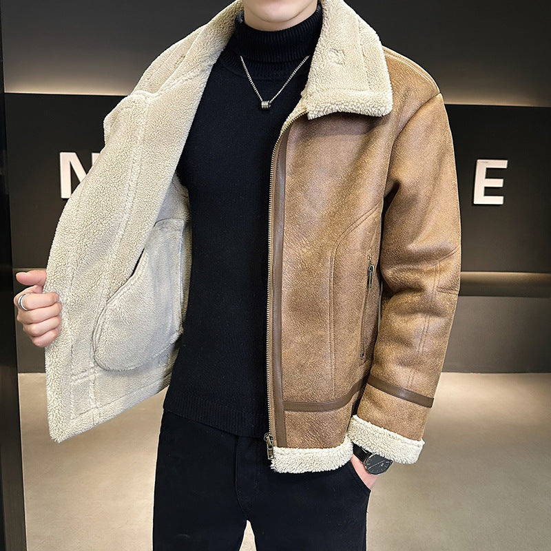 Brown leather motorcycle jacket with cream shearling lining, wide aviator collar, and zip-front closure worn over black knit.