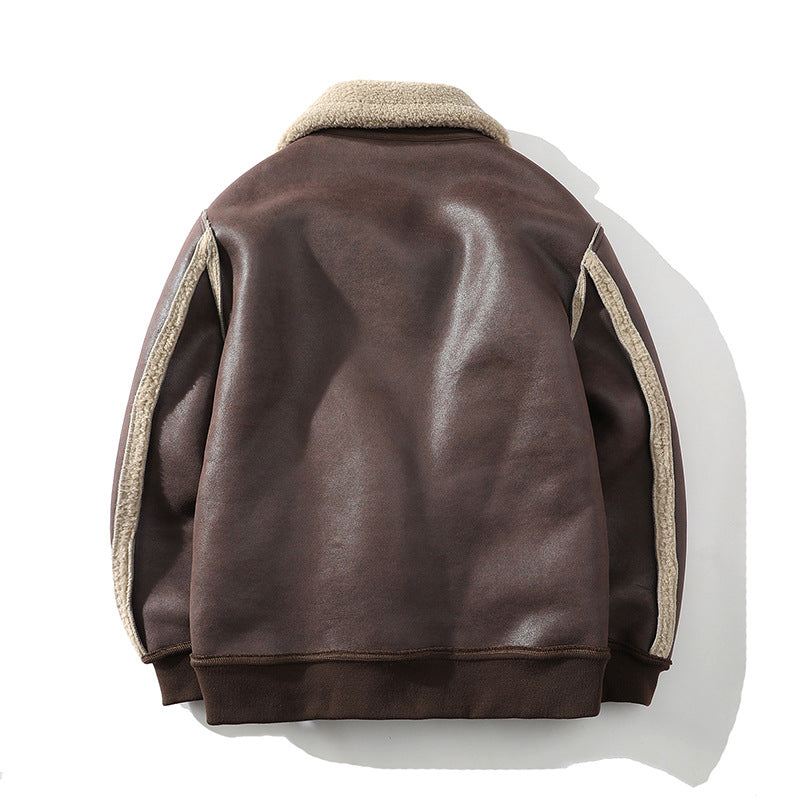 Brown vegan leather aviator jacket featuring a plush sherpa collar and contrasting sherpa-lined seam detailing.