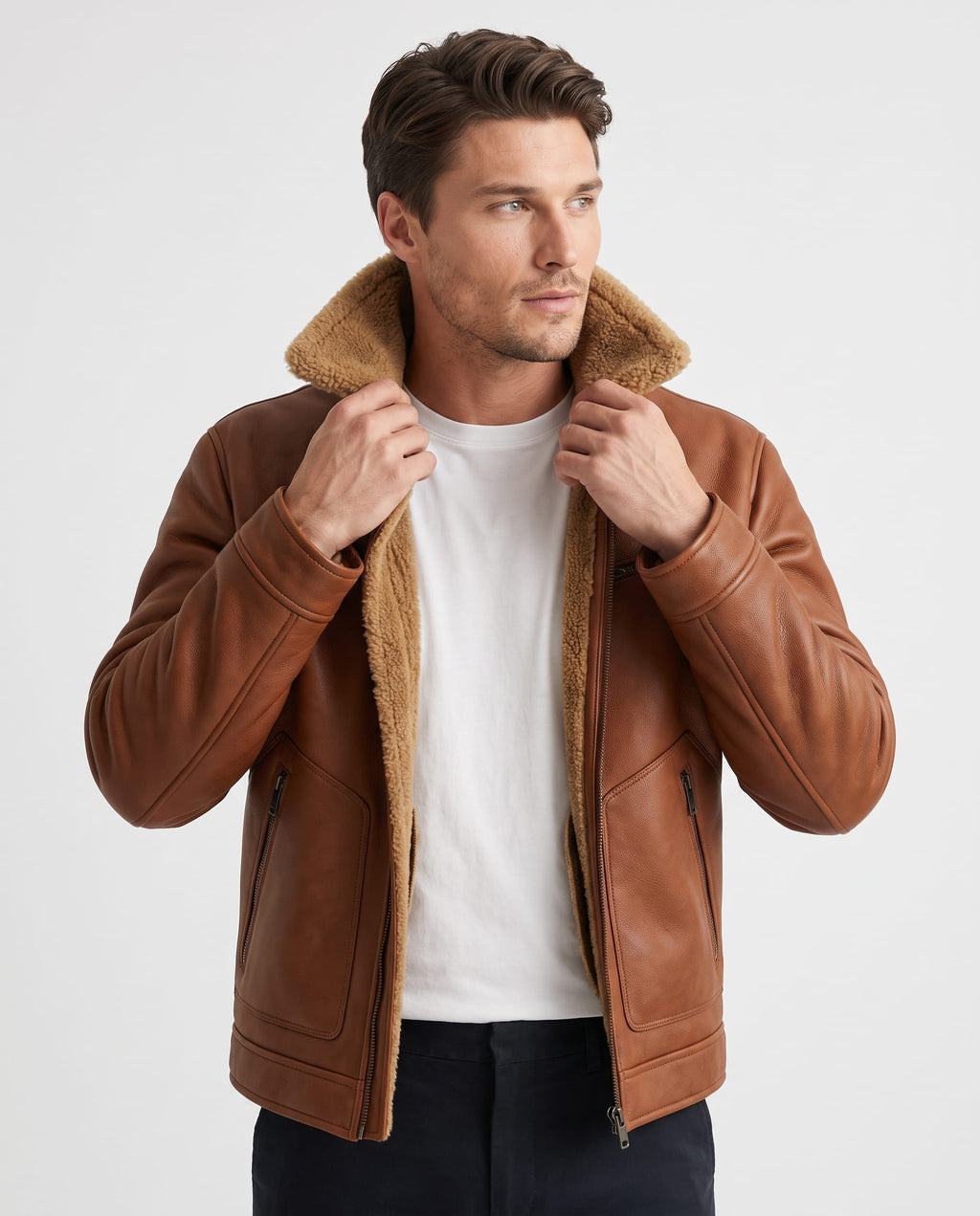 Brown vegan leather aviator jacket featuring a plush sherpa collar, zip pockets, and a warm interior lining.