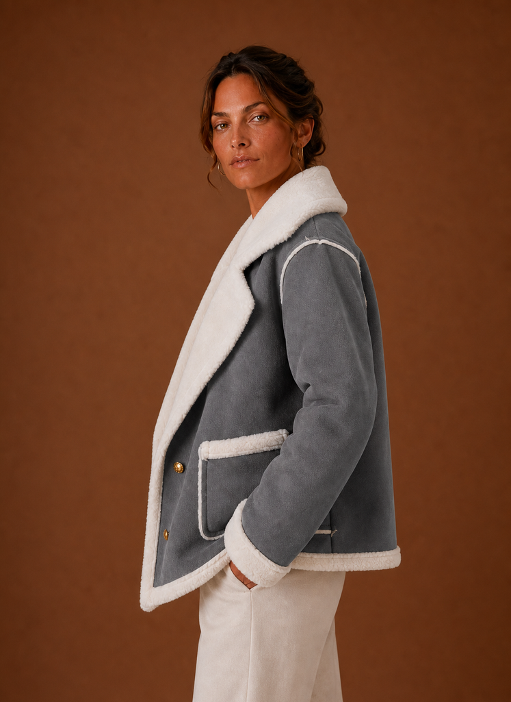 Grey suede-look aviator jacket with plush white sherpa trim on the wide lapels, cuffs, and pocket welts.