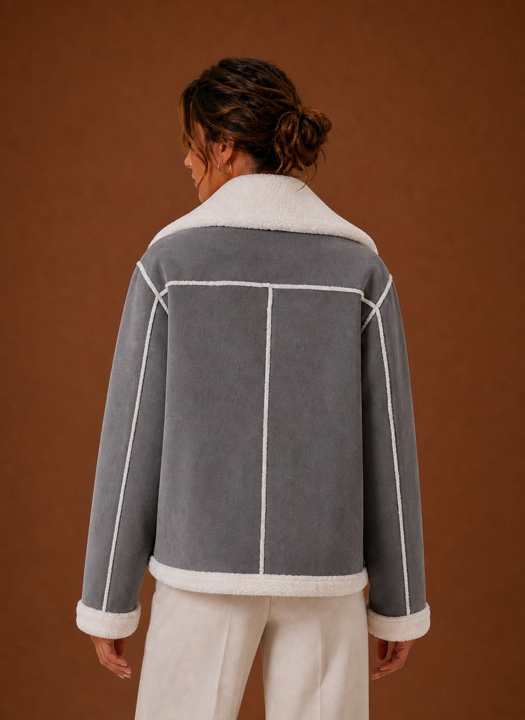 Grey suede-look aviator jacket with plush white sherpa collar, cuffs, and hem trim, shown from the back.