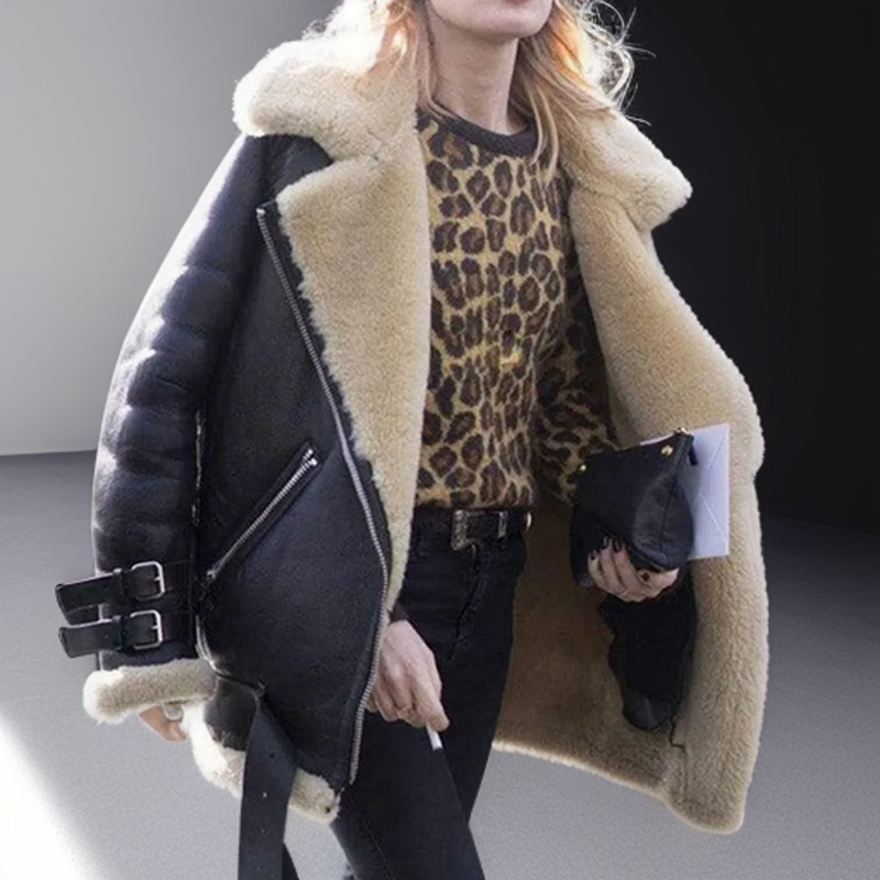 Black vegan leather aviator jacket with oversized cream sherpa collar, plush lining, and adjustable buckle cuff straps.