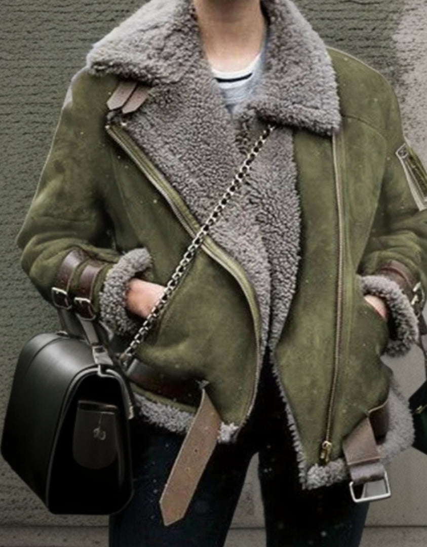 Olive green vegan leather aviator jacket with plush grey sherpa lining, oversized collar, and adjustable buckle straps.