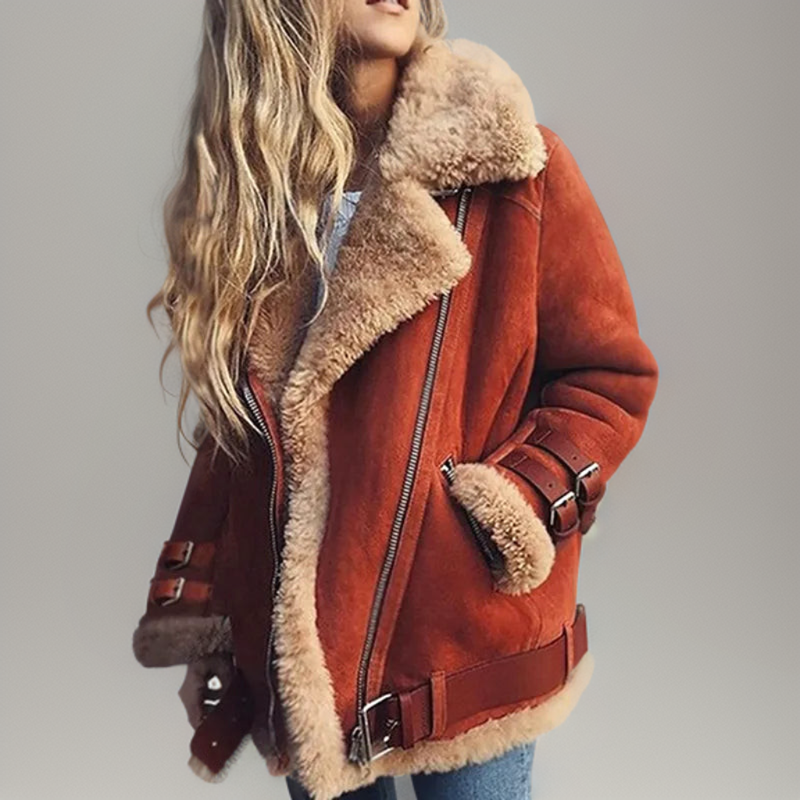 Rust orange-colored vegan leather aviator jacket with plush sherpa lining, oversized collar, and adjustable buckle straps.