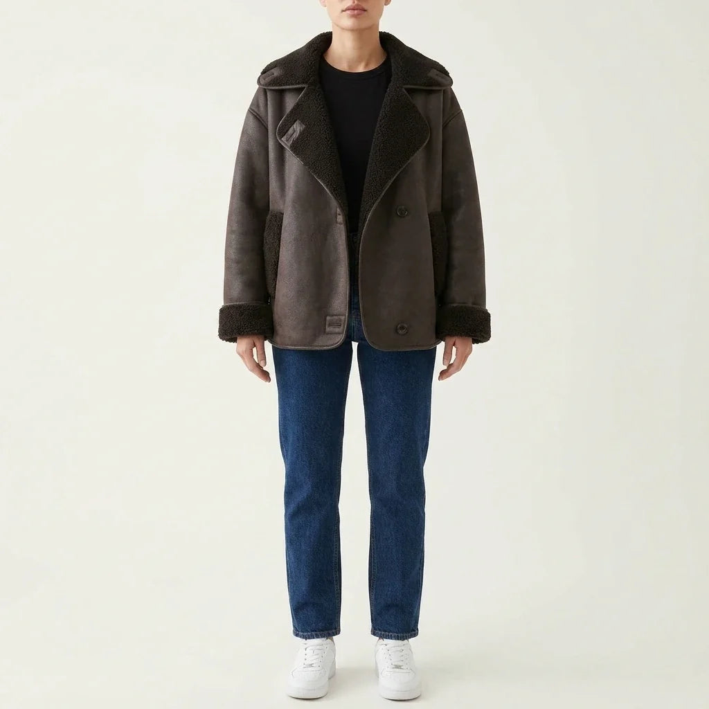 Oversized dark brown vegan suede jacket with plush sherpa lining, double-breasted buttons, and a relaxed fit.