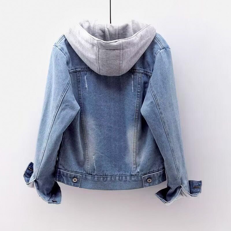 Back view of a women's light wash denim jacket featuring a gray hood, classic denim seams, and a relaxed fit.