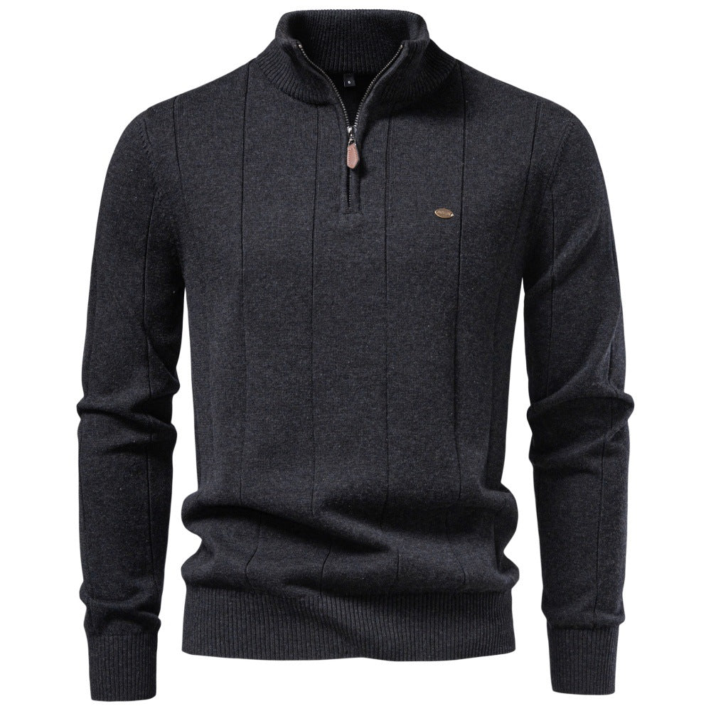 Black stretch cotton quarter-zip sweater with vertical knit detailing and a ribbed stand collar.