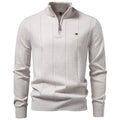 Light gray stretch cotton quarter-zip sweater featuring vertical knit detailing, a ribbed stand collar, and long sleeves.
