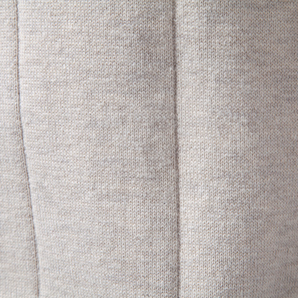 Light gray stretch cotton sweater fabric featuring fine vertical knit lines and a soft, textured weave.