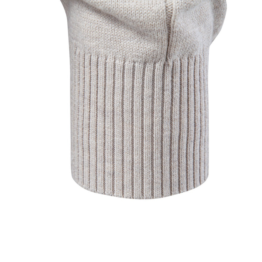 Light gray stretch cotton sweater sleeve featuring a fine vertical knit texture and a wide, ribbed cuff detail.