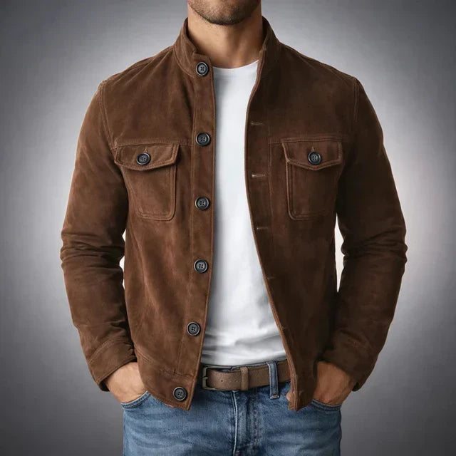 A man wearing a dark brown suede jacket with button closure and chest pockets