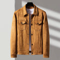 A brown suede trucker jacket with a point collar, button-front closure, and boxy fit, front view