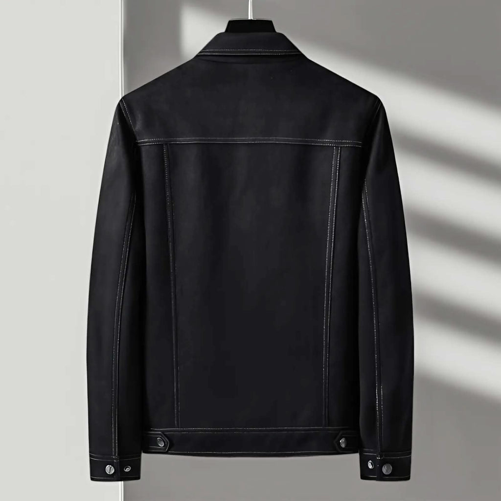 A black suede trucker jacket with a point collar and button-front closure, shown from the back