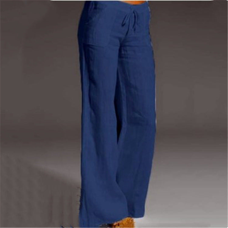 Women's royal blue wide-leg linen pants featuring a relaxed fit, drawstring waist, and lightweight breathable material.