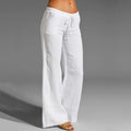Women's white wide-leg linen pants with a drawstring waistband, relaxed silhouette, and soft linen fabric.