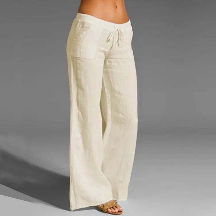 Women's off-white wide-leg linen pants with a drawstring waistband, relaxed fit, and lightweight breathable fabric.