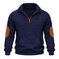 Navy blue quarter-zip pullover in textured mini-check jacquard with contrast brown elbow patches and kangaroo pocket.