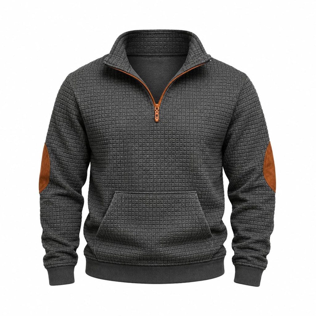 Charcoal grey quarter-zip pullover with mini-check jacquard texture, contrast brown elbow patches, and kangaroo pocket.