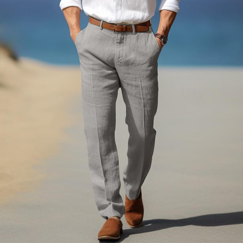 Man wearing gray linen trousers with a pleated front, straight-leg fit, and breathable linen fabric.