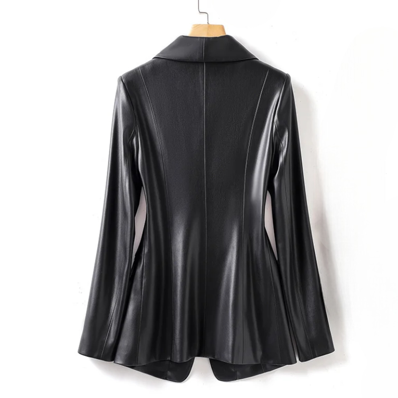 Back view of the licorice black vegan leather blazer showing the flared silhouette and back seaming