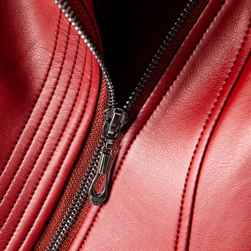 Close-up of the modern asymmetrical zipper on the Valeria Vegan Leather Jacket
