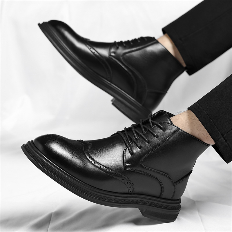 A model in black trousers mid-step, showing the sole and side profile of a black leather brogue boot, on a white sheet.