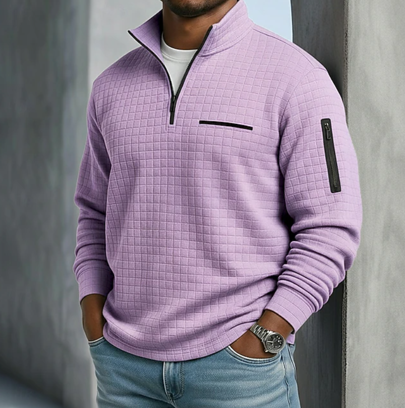 Lavender waffle-knit quarter-zip sweater with a relaxed fit, black zipper details, and a textured grid surface.