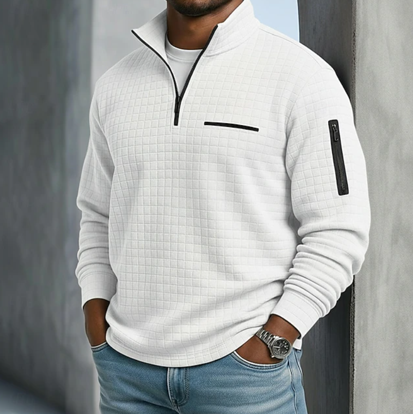 White waffle-knit quarter-zip sweater with a relaxed fit, black zipper details, and a textured grid pattern.
