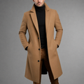 Camel wool blend longline overcoat featuring a structured slim fit, notched lapels, and a classic button-front closure.