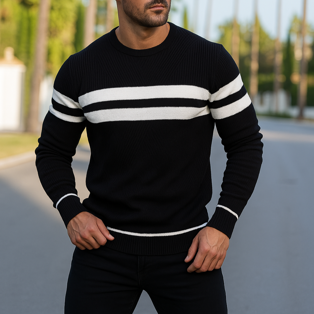 Man wearing black and white striped crewneck knit sweater, studio close-up torso view