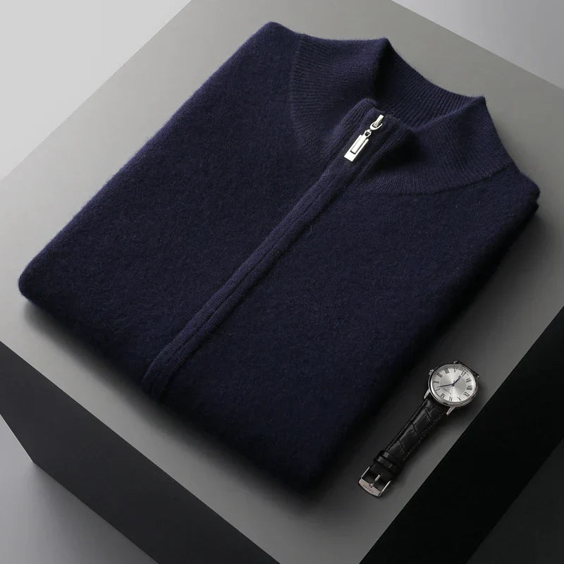 Folded men's navy zip-up knit sweater vest with a stand collar and smooth fine-knit construction.